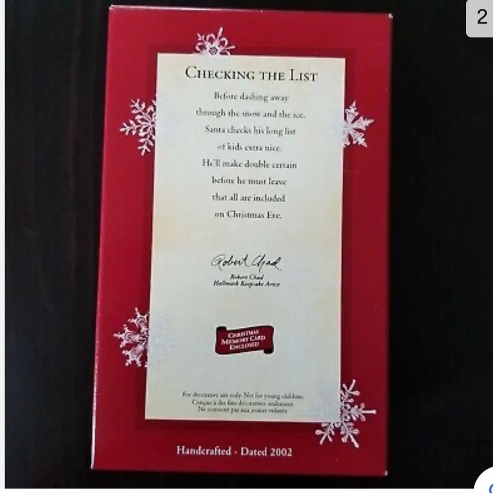 HALLMARK ORNAMENT CHECKING THE LIST 2002